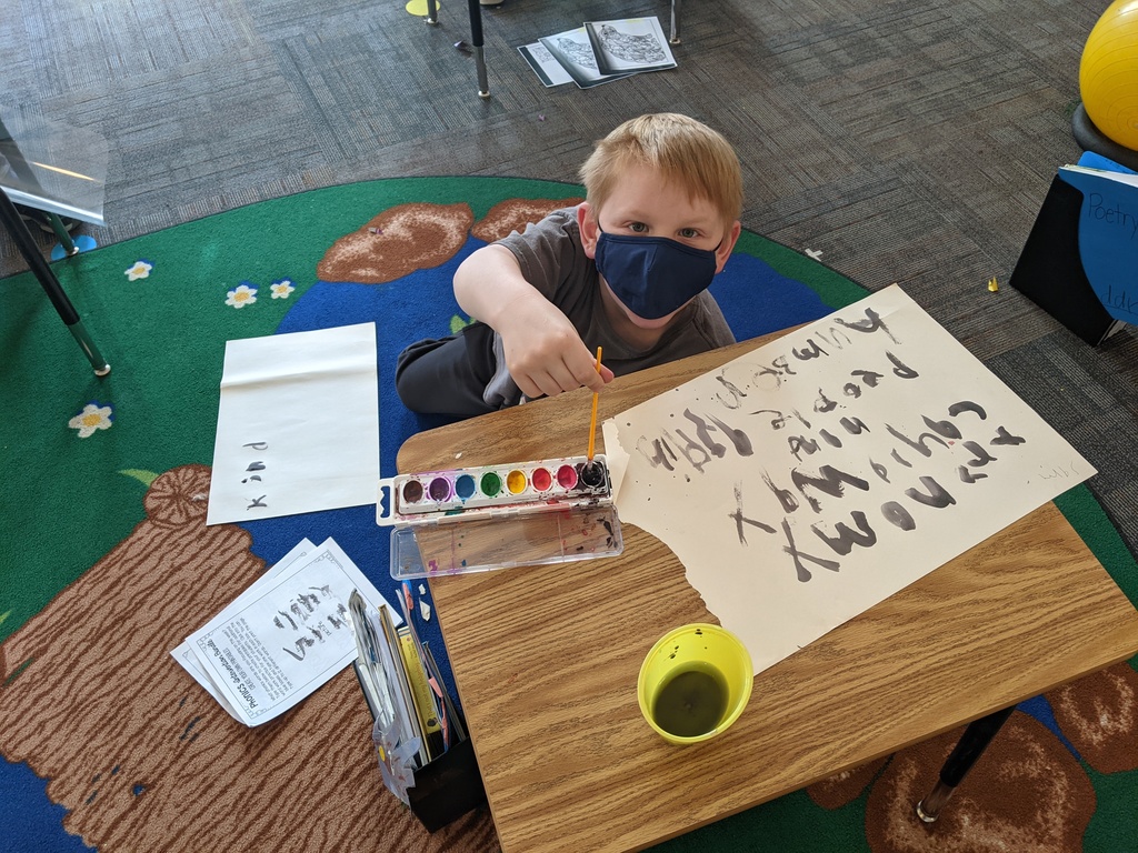 Sam paining his word words.