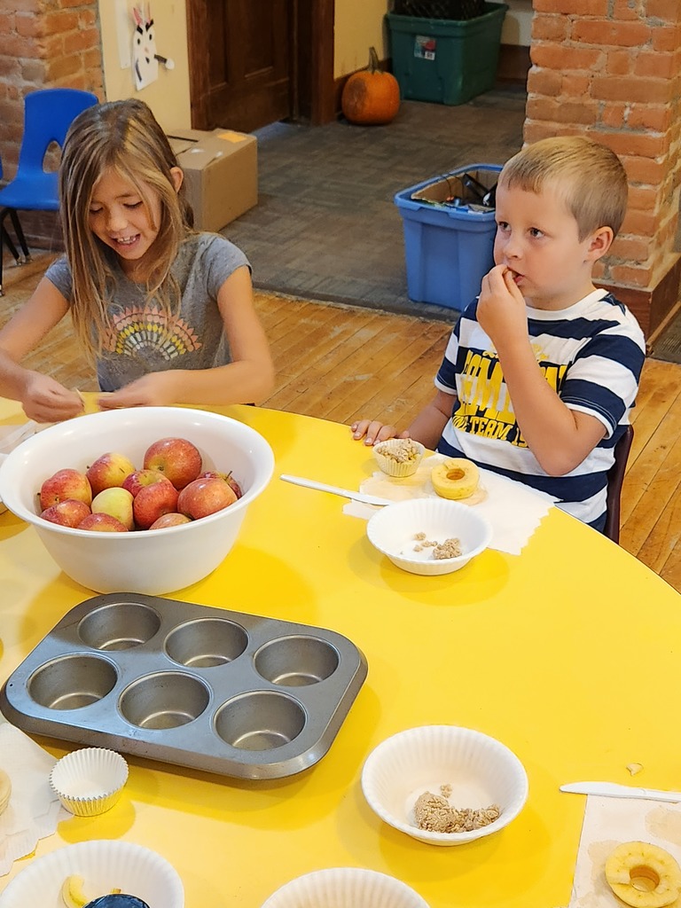Some more "Apple Day" pictures of students learning while having fun, making apple crisp!
